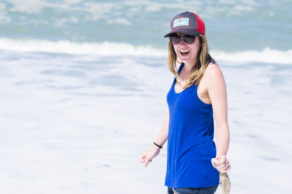 Britt smiling on the beach.